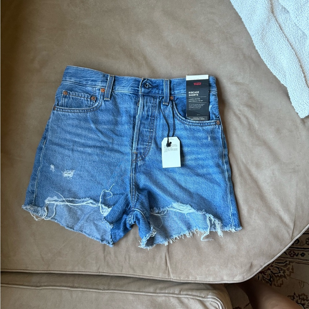 Levi's Blue Jean Shorts with Distressed Hem and Raw Edges